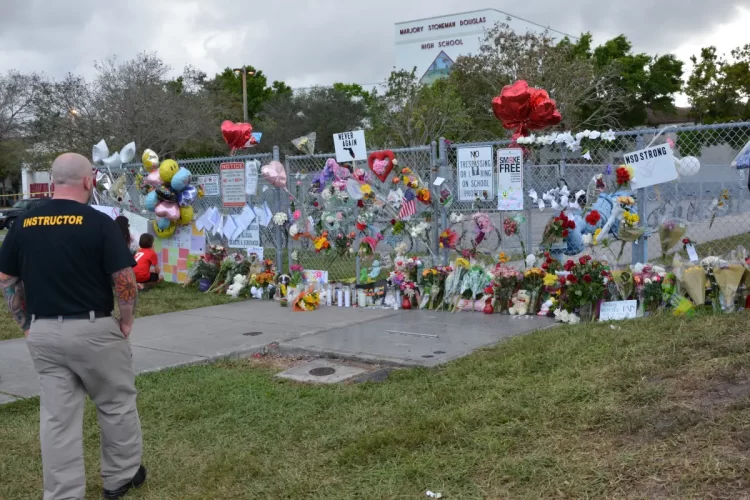 Tom Czyz outside Marjory Stoneman Douglas High School